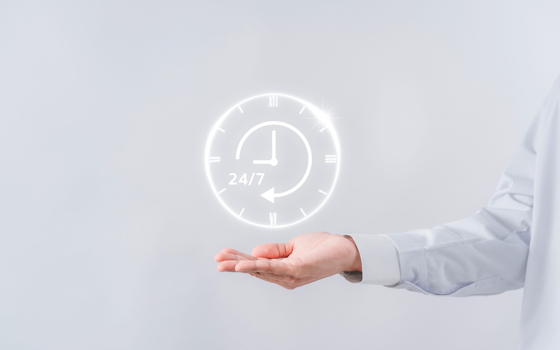 Doctor in a white coat uniform holding 24/7 service icon for assistance patient when accident or emergency, Medical call center service without interruption day and night.